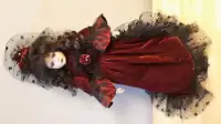 Vintage porcelain doll in red lace dress. OBO.