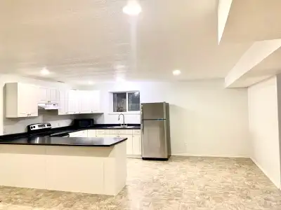 Modern open concept suite located near St. John’s hospital. 3 bedroom, 1 bath with in suite laundry....