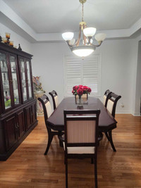 Dining table with 6 chairs and hutch