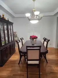 Dining table with 6 chairs and hutch