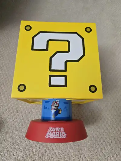 Light up your gaming space with this Super Mario Question Block lamp! It's in good, used condition a...