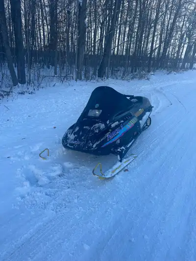 This is a 1990 Skidoo Mach 1 670 body with a 1998 Skidoo MXZ 583 R.A.V.E. motor. Legendary motor pai...