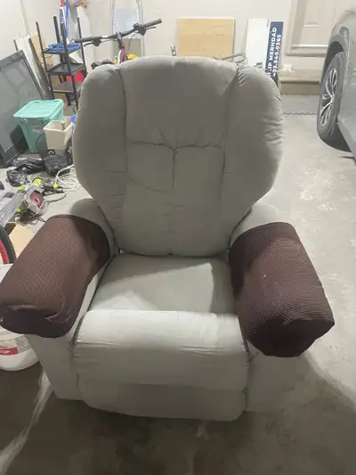 This comfortable rocking recliner is in good condition and perfect for relaxing after a long day. It...