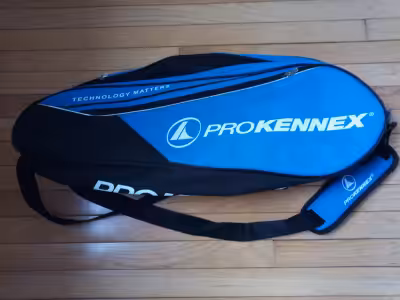 BRAND NEW Blue and Black ProKennex Badminton Bag. Has over the shoulder strap and all the room you n...