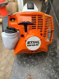 Stihl kombi power head and sweeper $550