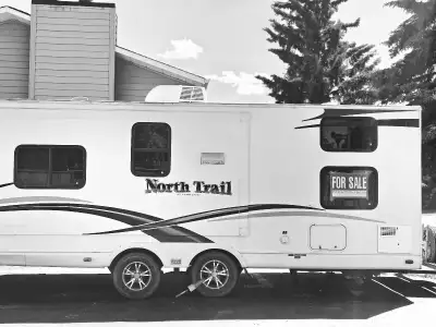 THIS 2012 HEARTLAND 28BRS IS A WELL LOVED CAMPER TRAILER, PERFECT FOR YOUR NEXT FAMILY ROAD TRIP ADV...