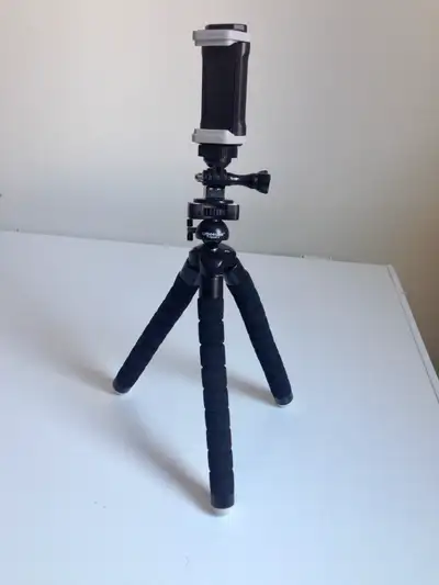 Mini camera tripod with flexible legs and cell phone adapter, View more