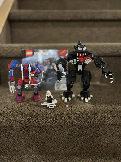 Great condition and comes with original instructions! LEGO Marvel Spiderman venom and Spidey meca ro...