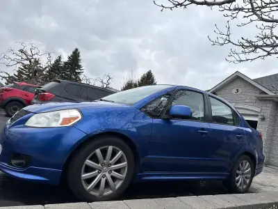 I'm selling my Suzuki SX4, a compact and reliable sedan that's perfect for city driving and beyond....