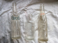 Vintage Coke and Pepsi bottles