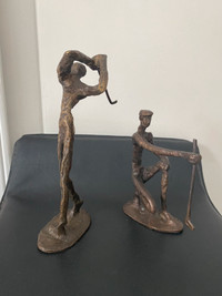 2 vintage mid century bronze brutalist golfer sculptures. 