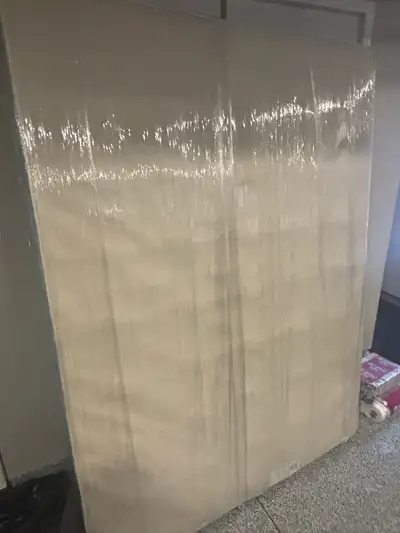 Excellent condition queen box spring Selling as bought a bed frame Shrink wrap protected for transpo...