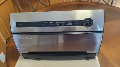 "Food Saver" vacuum sealer model V325 ....very good condition NO bag rolls included but can show you...