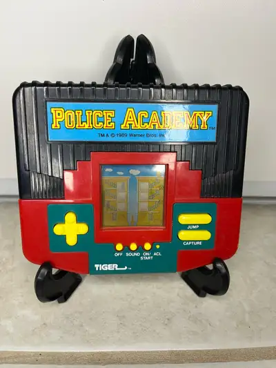 Tiger Electronics 1989 Warner Bros POLICE ACADEMY Handheld Game, View more