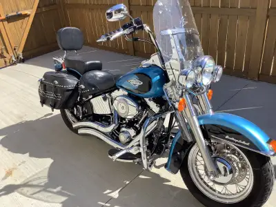 2011 Harley Davidson babied, low mileage, windshield, bags, pipes, always stored in heated garage ne...