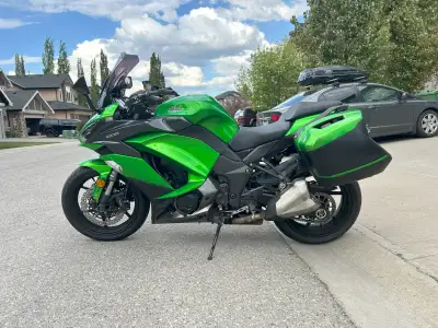 Kawasaki Ninja Z1000SX ABS with OEM hard bags and liners! Near new condition. Stored inside under co...