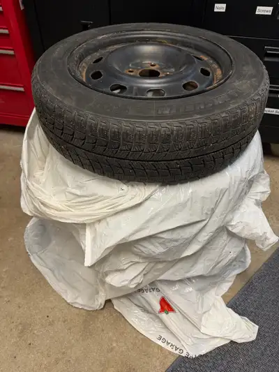 Michelin X-Ice Winter Tires on steel rims. 175/65R15, 4 hole Roughly half tread remaining (well abov...