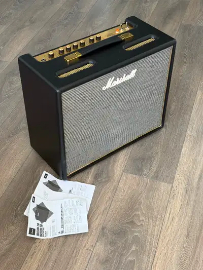 Selling my Marshall Origin 20 combo amp. Awesome all tube amp that absolutely nails the classic vint...