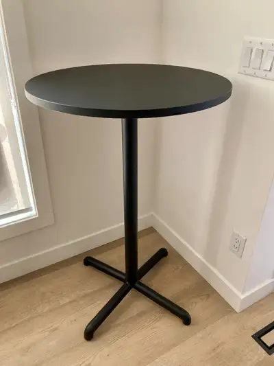Ikea Stensele round bar height table with stylish black matte surface. Like new condition. Sturdy wi...