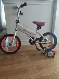 Girl's bike 14" , with training wheels.