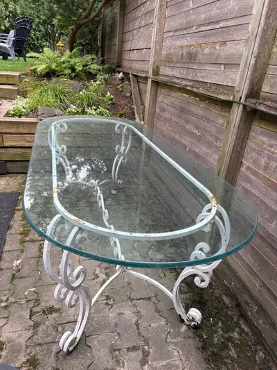 Solid glass and wrought iron table, View more