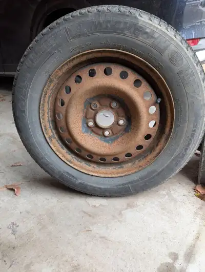 Set of 4 16-inch steel rims (5 x 114.3 mm bolt pattern), with winter tires (P215/60R16) mounted. The...