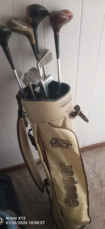 Old golf clubs and bag, View more