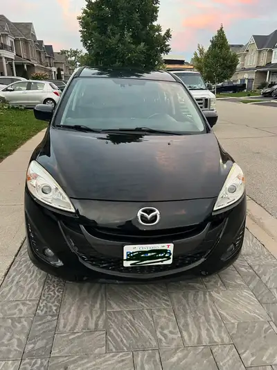 2012 - 236K driven- Black Mazda 5 minivan Lady driven- has a compact multi-purpose vehicle design wi...