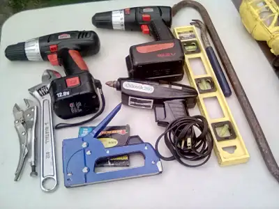 $5 each, both drills, stapler, glue gun and adjustable wrench are sold.