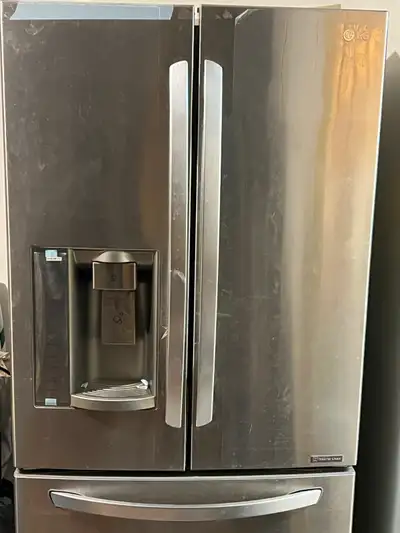 LG Refrigerator Stainless Steel. New Compressor. Doesn't Cool, View more