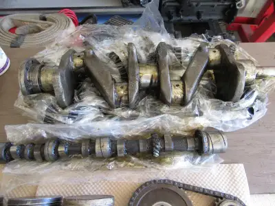 Tr4 trunk lid, many engine parts, looking for reasonable offers, trunk lid $900, crankshaft is in ve...
