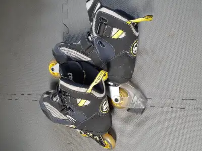Patins àa roulettes Ultra Wheels Biofit SQ 6.7 pour homme, pointure 8.5. Très peu d'usure.