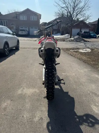 Near mint 2014 (not air shocks), still on original tires! Has skid plate, hand guards and rad suppor...