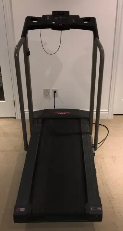 Proform treadmill. Features adjustable elevation, easy to read mileage and calorie counter. Folds up...