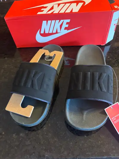 Black Nike sandals, View more