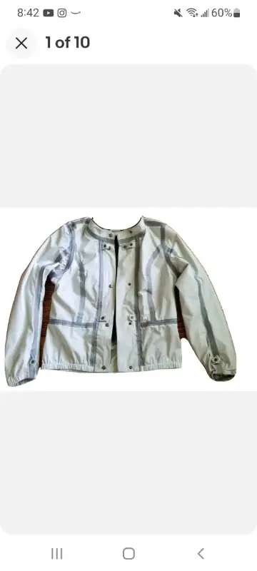 Waterproof/windproof with felt liner interior and 2 pockets. Excellent condition! Can be used with m...