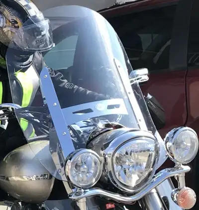 OEM Windshield with the mounting hardware, for a Yamaha V-Star 1300 motorcycle. High-quality, clear...