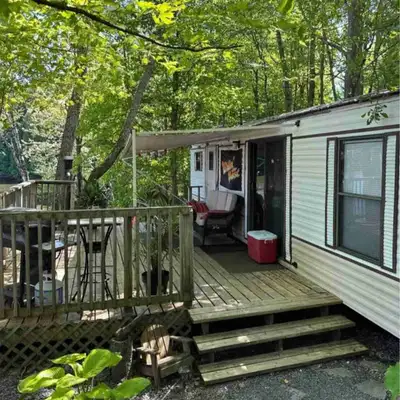 12x34 foot, two bedroom trailer with steel roof (2020) Working fridge, window unit A/C, laminate flo...