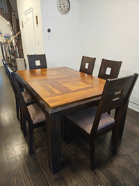 Solid Wood extendable leaf table with six chairs 