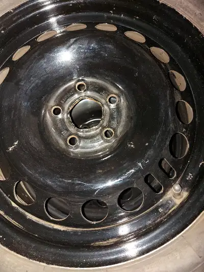 (4) good tires on GM factory rims that are like new. 110mm bolt pattern or so, lol