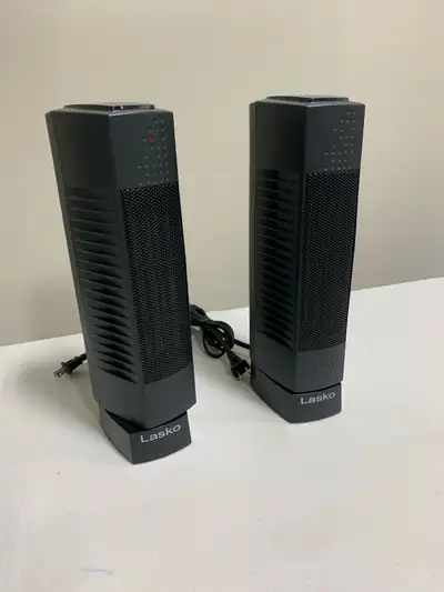  Two Lasko 1500 W electric heaters, View more