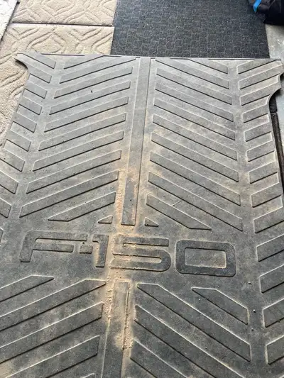 Truck box floor mat from F150 cut to fit Ram 1500 short box in great condition
