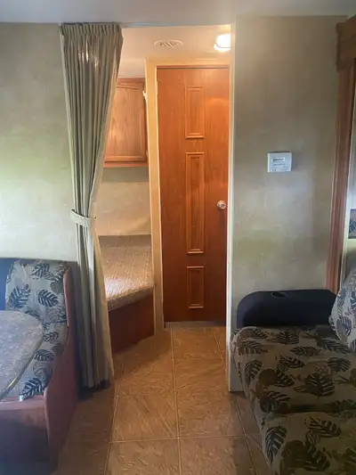 Jayfeather trailer, front queen bed, bunk in back with double under and single above. Very clean, no...