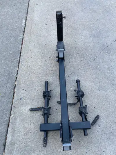 In excellent condition. 2'' to 1.25'' Trailer Hitch Receiver hitch-mounted bike rack designed to tra...