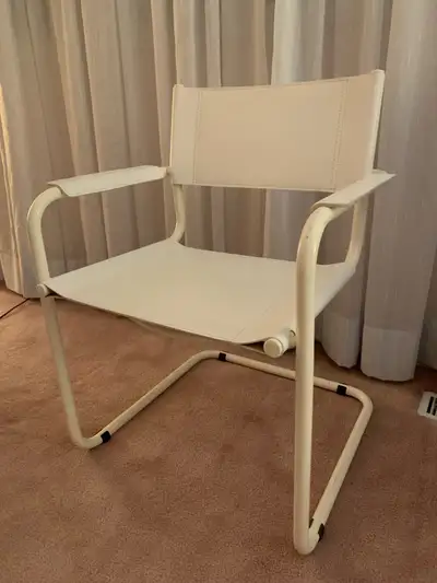 White leather chair with arm rests, View more