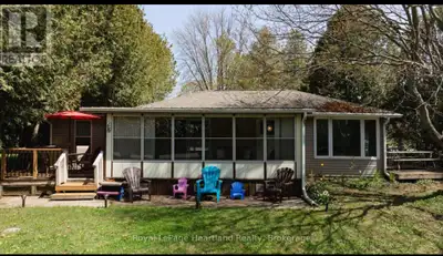 Welcome to your idyllic three-season cottage retreat, where tranquility and comfort blend seamlessly...