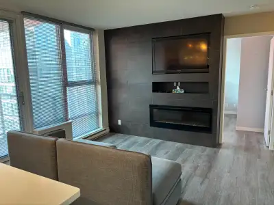 Spacious 1-bedroom + den, 1-bathroom unit in a well-located downtown building with resort-style amen...