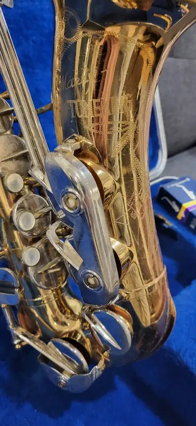 This is a Marly Tone King alto sax made by Keilwerth in Germany. Good condition with a few dings. Ne...