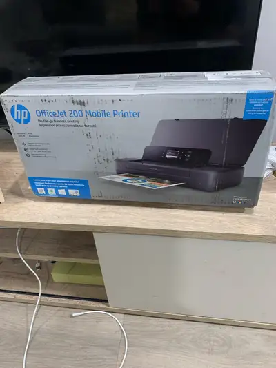 Imprimante sans fil-Wireless printer Neuve dans la boîte, jamais utilisé. Brand new still in box. Ne...
