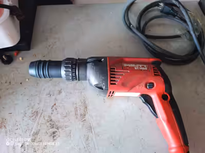 This is a used Hilti ST 1800 drill, perfect for a variety of drilling tasks. This tool has seen some...